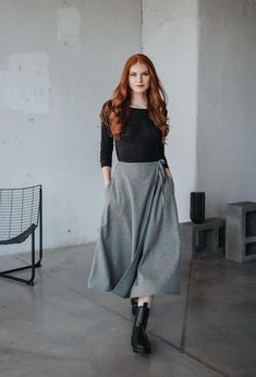 Embrace timeless elegance with our wrap wool skirt, designed for both style and functionality. This skirt features a classic wrap design with a tie waist, allowing for an adjustable fit that flatters your figure. Crafted from high-quality wool, it provides warmth and a sophisticated, structured look, making it ideal for cooler weather. Designed with convenient side pockets, this skirt combines practicality with style, making it perfect for both casual outings and more formal occasions. Its versa Winter Wrap Skirt, Winter Full-length Stretch Skirt, Relaxed Long Wool Skirt, Winter Stretch Full-length Maxi Skirt, Long Wool Skirt Burgandy Red, Wool Wrap Skirt, Wool Midi Skirt, Skirt Wool, Plus Size Skirt