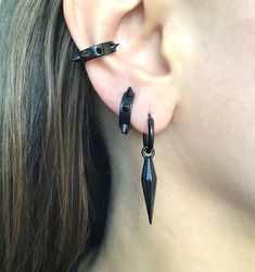 Metal Huggie Cartilage Earrings, Edgy Pierced Hoop Earrings As Gift, Surgical Steel Hoop Pierced Jewelry, Edgy Hoop Earrings As A Gift, Edgy Small Hoop Pierced Earrings, Edgy Metal Hoop Piercings, Pierced Hoop Jewelry For Streetwear, Punk Style Hoop Cartilage Earring, Punk Stainless Steel Pierced Cartilage Earrings