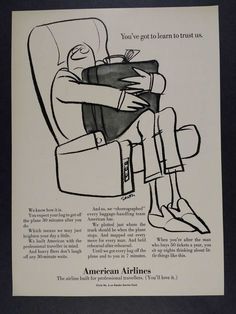 an advertisement for american airlines with a man sitting in a reclining chair holding a book