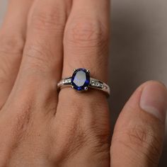 This is a gorgeous handmade creation. Its beauty is its simplicity & Elegance. The 7*9 mm oval shape faceted lab sapphire is crafted in solid sterling silver and with rhodium plated. All item is sent in a beautiful gift box If you have any idea of design your ring,pls contact me directly. You can realize more lovely stuff clicking the link https://www.etsy.com/shop/knightjewelry?refshopsection_shophome_leftnav Please leave the correct address and you phone number for delivering successfully. Engagement Ring Blue, September Birthstone Ring, Oval Sapphire Ring, Blue Engagement Ring, September Birthstone Rings, Oval Cut Engagement Ring, Blue Sapphire Ring, Ring Blue, Ring Oval