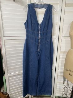 Y2K Blue Denim Jeans One Piece Jumper Pants Suit Women's S Small 100% Cotton Super cute. Big silver zipper down the bodice. Sleeveless. Keyhole back. Wide legs. Has a 70s vibe. Measurements taken laying flat Pit to pit 18.5" Waist 15" Hips 19.5" Inseam 29" Length shoulder to hem 57" Leg Width flare 11.5" One Piece Jumper, Jumper Pants, Jeans Denim, Blue Denim Jeans, Suits For Women, Denim Jeans, Blue Denim, Jumper, Jumpsuit Romper