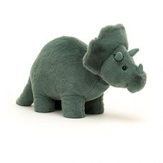 a green stuffed animal that looks like a rhinoceros with a hat on it's head