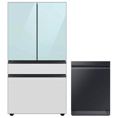 a refrigerator and freezer sitting next to each other on a white background with black accents