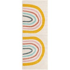 a white rug with multicolored circles on it