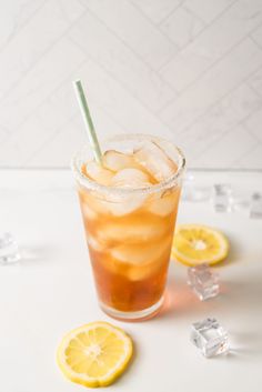 an iced drink with ice and lemon slices