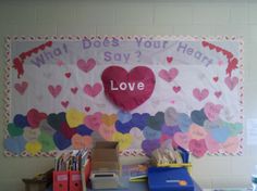 a bulletin board that says what does your heart say? love with hearts on it