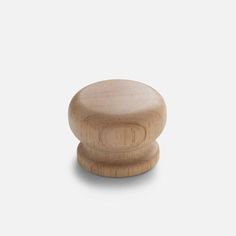 a wooden knob on a white background