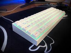 a computer keyboard sitting on top of a table