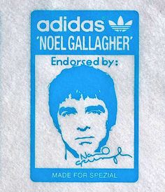 the identification badge for noel galalagher is shown in blue on white paper with black writing