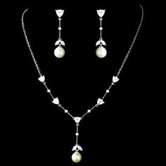 "This truly captivating Cubic Zirconia and pearl necklace will leave you breathless. It is delicate and refined and a beautiful set to wear after wedding for a special occasions or evening out. READY TO SHIP DETAILS: Necklace * Size: 15.5\" (Necklace Length) with 2\" (extender) & 1.5\" center drop Earrings * 1.5\" (Earring Length) * Offered in Silver COMPLETE COLLECTION: including Sashes, Hairpieces, Jewelry & Vintage Bags http://www.etsy.com/shop/AGoddessDivine?ref=si_shop A Goddess Divine Crea Elegant Pearl Bridal Sets With Pearl Drop, Elegant Pearl Bridal Sets For Formal Occasion, Elegant White Bridal Sets With Pearl Drop, Elegant Pearl Bridal Sets For Weddings, Diamond Pearl Drop Necklace For Wedding, Classic Diamond Pearl Necklace For Wedding, Wedding Pearl Drop Necklace With Diamonds, White Gold Pearl Necklace With Cubic Zirconia For Wedding, Elegant Pearl Drop Bridal Set For Wedding