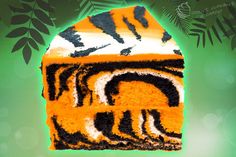 a slice of tiger print cake on a green background