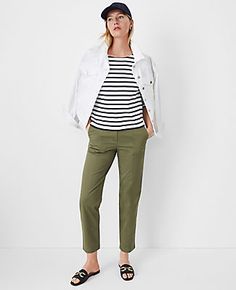 Discover Ann Taylor Weekend. Effortlessly polished pieces for wherever your plans take you. Front zip with button closure. Belt loops. Front off-seam pockets. Back welt pockets.,Leg Shape:Leg Shape: Straight – a leg-skimming shape with tailored, timeless versatility,Rise:High rise: sits 1/2" to 1" below natural waist,Imported:Imported,Fit:Fit: Relaxed & easy,Length:Hits at ankle: 27" inseam with 16" leg opening,Fabrication:97% Cotton, 3% Spandex,Garment Care:Machine Washable Seamed Straight Ankl Elastic Ankle Pants Outfit, Green Capris Outfit, Khakis Outfit For Women, Ann Taylor Outfits, Ankle Pants Outfit, Ann Taylor Outfit, Olive Green Outfit, Khakis Outfit, Casual Office Attire