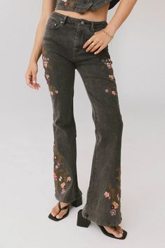 Floral Embroidery Flare Leg Fit Zipper and Button Closure Two Hand, Back Pockets 98% Cotton, 2% Spandex Hand Wash Cold, Line Dry Matching Pieces Sold Separately Model Info Height: 5'8" Wearing Size: X-Small ~section 2~ SIZE US SIZE WAIST RISE INSEAM X-Small (00-0) 27" 9.5" 31" Small (2-4) 28" 10" 31" Medium (6-8) 31" 10.25" 31.5" Large (10-12) 32" 10.5" 31.5" X-Large (14-16) 34" 11" 32" **For more specific information on the product, please feel free to email us at webteam@bohme.com Embroidered Black Jeans, Embroidered Non-stretch Bottoms For Fall, Stretch Floral Embroidered Bottoms, Spring Stretch Jeans With Floral Embroidery, Spring Embroidered Stretch Bottoms, Embroidered Vest, Dad Jeans, Wide Leg Jeans, Floral Embroidery