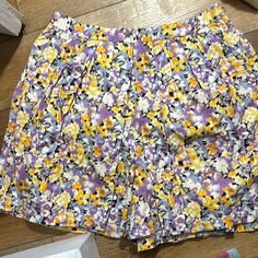 New With Tags Cotton Shorts, But Looks Like A Skirt. Pleated Zipper On The Side Combine With Two More Of My Items To Get 30% Off And Seven Shipping Give Me An Offer. Summer Floral Print Short Skort, H&m Shorts For Spring Day Out, H&m Shorts For Day Out In Spring, Yellow Bottoms With Floral Print For Spring, H&m Summer Mini Skirt, H&m Mini Skort For Summer, H&m Summer Mini Skort, Yellow Floral Print Bottoms For Spring, Yellow Short Skort For Spring