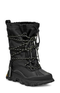 Designed with a cuff that can be adjustable to be shorter, this lightweight and insulated boot is the one to wear for outdoor treks. The lining is a moisture-wicking textile that's made from a wool-rich blend but crafted to feel and wear like genuine shearling. 2 1/2" heel; 1 1/4" platform (size 8.5) 9 1/2" shaft; 18 1/2" calf circumference Lightweight: puts cushioning and performance underfoot with an emphasis on streamlined comfort Pull-on style with drawcord-toggle closure Gore-Tex® waterproo Weatherproof Boots, Insulated Boots, Mid Boots, Walker Shoes, Moon Boots, Metal Lace, Winter Snow Boots, Waterproof Boots, Emphasis