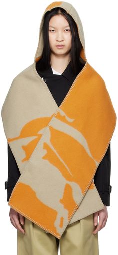 Felted woven wool hood-style scarf in beige and orange. · Jacquard logo graphic throughout · Blanket stitching at edges · H12 x W79 Supplier color: Hunter/Pumpkin Butberry Scarf, Taupe Blanket, Hood Style, Style Scarf, Burberry Scarf, Hooded Scarf, Blanket Stitch, Textile Patterns, Logo Graphic