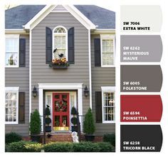 a house with red front door and black shutters on the windows is shown in this color scheme