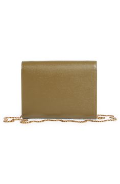 A pivoting monogram clasp adds heritage polish to this envelope wallet made from calfskin leather embossed to mimic the texture of grain de poudre. A removable chain strap gives you the option to carry it as an elegant evening bag. Turnlock closure Removable chain shoulder strap Interior wall pocket; three card slots Leather lining Leather Made in Italy Designer Handbags Chic Formal Wallet On Chain With Logo Plaque, Elegant Evening Wallet On Chain With Logo Plaque, Gold Wallets With Detachable Strap For Formal Occasions, Gold Formal Wallet With Detachable Strap, Classic Gold Wallet On Chain For Formal Events, Classic Gold Wallet On Chain For Formal Occasion, Classic Evening Wallet On Chain With Logo Plaque, Classic Formal Wallet On Chain With Logo Plaque, Elegant Wallet On Chain With Logo Plaque