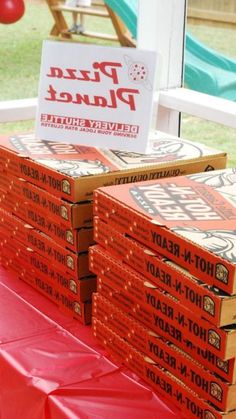 pizza boxes are stacked on top of each other