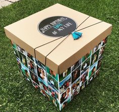 a box with pictures on it sitting in the grass