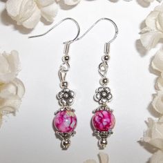 Funky Pink Beaded Earring Set Handmade Silver Flower Floral Barbiecore New 4161 This Costume Jewelry Earring Set Is Brand New And Handmade By Me - Wvluckygirl. Handcrafted With Pink And White Glass Beads With Hints Of Blues And Yellows. They Also Have Silver Toned Costume Jewelry Beads Which Were Antiqued In Black. One Of The Silver Beads Is In The Shape Of A Flower. The Pair Dangle & Drop From 925 Sterling Silver French Fis Hook Ear Wires For Pierced Ears. Measure 1 7/8 Inches Long And Not Quit Elegant Flower Beaded Earrings, Silver Beaded Flower Jewelry, Silver Flower Beaded Earrings For Gift, Silver Flower Beaded Earrings As Gift, Silver Beaded Earrings With Round Beads As Gift, Silver Hypoallergenic Beaded Earrings, Handmade Silver Beaded Flower Earrings, Handmade Silver Flower Beaded Earrings, Elegant Adjustable Flower Shaped Beaded Earrings