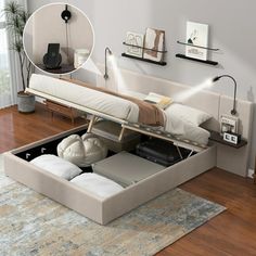 a bed that is sitting in the middle of a room with its drawers open and some pillows on it