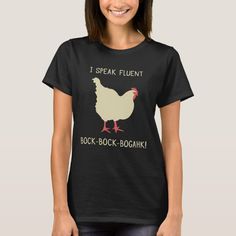 a woman wearing a black t - shirt with a chicken saying i speak fluent