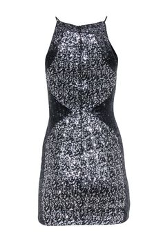 Get ready to dazzle at your New Year's Eve party with this mini dress from Dress The Population! With its black and silver sequins and sleeveless design, you'll be the center of attention all night long. Perfect for those who love to shimmer and shine! Size XS Made in USA Shell 90% Polyester, 10% Spandex Lining 97% Polyester, 3% Spandex Invisible zipper back Sleeveless Bust 30" Waist 25" Shoulder to hem 33" Sleeveless Sequin Dress For Club And Holiday, Sparkling Sleeveless Mini Dress For Cocktail, Sleeveless Sparkling Cocktail Mini Dress, Black Sleeveless Sequin Dress For Club, Black Sleeveless Sequin Dress With Contrast Sequins, Black Mini Dress With Contrast Sequin For Holiday Party, Black Contrast Sequin Mini Dress For Holiday Party, Sleeveless Mini Dress With Contrast Sequin For Holiday Party, Sleeveless Contrast Sequin Mini Dress For Holiday Party