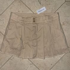 Khaki Mini Skirt With Shorts From Pacsun. Brand New With Tags. Size Large. Casual Skirted Skort For Spring, Spring Casual Lined Skort, High Waist Beige Skort For Summer, High-waist Beige Skort For Summer, Beige Skort With Pockets For Summer, Summer Beige Skort With Pockets, Casual High Waist Tennis Skirt For Spring, Casual Spring Tennis Skirt With Lining, Casual Cotton Skirted Bottoms