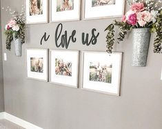 the wall is decorated with pictures and flowers