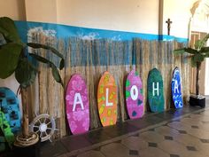 the surfboards are lined up on the wall