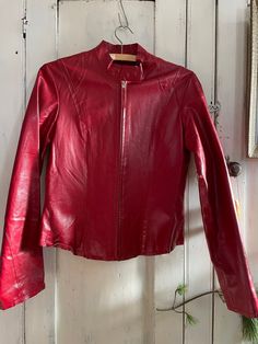 Superb le château jacket leather red color Medium size Motorcycle style fitted at the waist 40 inches height 16 inches shoulder to shoulder width 18 inches body width armpit to armpit 16 inch waist width Hardly used No refunds or exchanges Red Vintage Leather Jacket For Streetwear, Designer Red Fitted Leather Jacket, Red Vintage Leather Jacket With Long Sleeves, Fitted Red Leather Jacket With Button Closure, Vintage Red Leather Outerwear, Vintage Leather Jacket, Motorcycle Style, Vintage Leather, Favorite Outfit