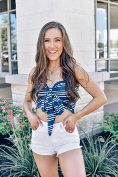 Perfect for those hot summer days, this navy top will be a go-to in your closet this summer! Style it with white shorts and gold jewelry to complete the look. Navy striped crop top Strapless Bow tie in front Smocked Runs true to size Piper is 5'2, wears a size 2 and is wearing a Small! Cropped Beach Tops With Smocked Back, Fitted Smocked Bandeau Crop Top, Summer Off-shoulder Smocked Back Tube Top, Fitted Smocked Top For Day Out, Mini Length, Off-shoulder Beach Top With Smocked Back, Striped Crop Top, Navy Tops, Navy Stripes, Hot Summer