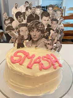 a cake that has been decorated with photos and the word sass on it,