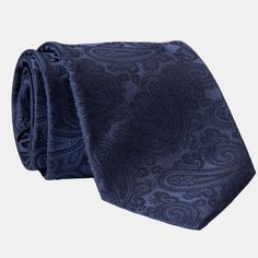 I believe in choosing pieces that stand out, which is why I love this intricate woven jacquard paisley tie in midnight blue. It’s a perfect choice for formal occasions, evening wear, or adding a touch of sophistication to your business attire. Handmade from luxurious thick silk, this tie offers a timeless elegance that’s anything but ordinary. Why settle for the usual when you can have something extraordinary? Details Standard Length: Approx. 3.25" x 58.5" (8 x 149cm). A classic tie width and le Luxury Blue Silk Ties, Luxury Blue Suit And Tie Accessories For Semi-formal Occasions, Elegant Silk Tie Accessories For Black-tie Events, Elegant Silk Suit And Tie Accessories For Black-tie Events, Elegant Silk Accessories For Black-tie Events, Elegant Blue Party Ties, Elegant Business Suit And Tie Accessories With Paisley Print, Elegant Blue Tie For Business, Elegant Blue Ties