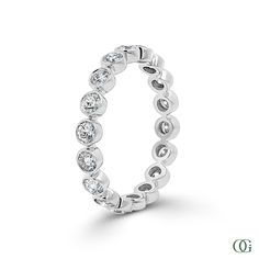 This Round Sparkle Eternity Band has a stunning 0.92 CTW of diamonds, creating a glamorous and timeless look. The round cut diamonds provide maximum sparkle, catching the light from every angle. The eternity band design symbolizes everlasting love, making it the perfect gift for a special occasion. Eternity Band With Single Cut Diamonds, Timeless Cubic Zirconia Diamond Ring, Silver Diamond Eternity Band Timeless Style, Round Eternity Band With Single Cut Diamonds For Anniversary, Dazzling Diamond Eternity Band, Brilliant Cut Diamond Eternity Band, Platinum Eternity Band, Eternity Band With Round Cut Single Diamonds, Classic White Gold Eternity Band