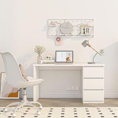 a white desk and chair in a room with a clock on the wall above it