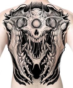 a man's back with an intricate tattoo design on his body and the image of a demon