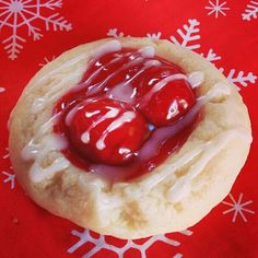 a close up of a cookie with jelly on it