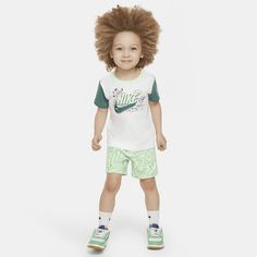 Featuring doodle inspired graphic prints, this 2-piece set is wearable encouragement for the athletes of tomorrow. The jersey knit tee is a classic cut with a tagless crewneck for easy wear. The matching French terry shorts have a stretchy waistband for a comfy fit kids can move freely in while they create multiple fun adventures of their own. Casual T-shirt With Character Print For Sports, Summer Athleisure T-shirt For Playwear, Sporty White T-shirt For Playwear, Cotton Athleisure T-shirt For Playwear, Playful Sports T-shirt For Summer, Casual Sports T-shirt With Character Print, Summer Sporty T-shirt With Character Print, Nike Sporty T-shirt For Play, Casual Character Print T-shirt For Play