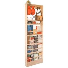 a wooden book shelf filled with lots of books