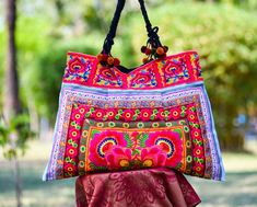 Embroidered Rectangular Hobo Bag For Festivals, Embroidered Multicolor Hobo Bag, Rectangular Multicolor Embroidered Hobo Bag, Traditional Multicolor Shoulder Bag With Removable Pouch, Multicolor Embroidered Rectangular Bags, Traditional Multicolor Bag With Floral Embroidery, Embroidered Multicolor Rectangular Shoulder Bag, Traditional Tote Bag With Floral Embroidery, Traditional Handheld Bag With Multicolor Embroidery