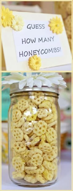 a jar filled with cheerios sitting next to a sign that says guess how many honeycombs