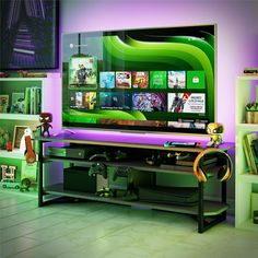 a large flat screen tv sitting on top of a wooden stand in a living room