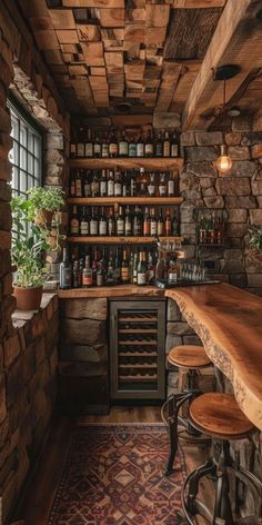 an old fashioned bar with wooden stools and stone walls