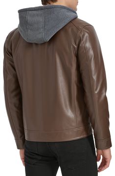 Ride off into the sunset in this sleek jacket expertly crafted from faux leather and topped with a jersey hood. 26 1/2" length Asymmetric zip closure Fixed hood Front welt pockets Lined 100% rayon with 100% polyurethane coating Spot clean Imported Brown Hooded Jacket For Fall With Zipper Closure, Brown Hooded Jacket For Fall With Zipper, Brown Hooded Biker Jacket With Zipper Closure, Fitted Leather Hooded Jacket For Fall, Leather Hooded Jacket With Zipper Closure, Urban Leather Jacket With Double-lined Hood For Fall, Fitted Leather Hooded Jacket With Double-lined Hood, Casual Leather Biker Jacket With Double-lined Hood, Hooded Leather Outerwear With Double-lined Hood