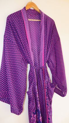 "Silk Polyester kimono robes are perfect for lounging around the home or spa. Use our silk robe as a cover up on the beach or after a dip in the pool. Add a luxe, boho feel to your bridal shower. Versatile, soft and luxurious, our silk kimono robes are printed with azo-free dyes. The silk Polyester robe features Full sleeves, a waist tie and two front pocket. Length - 50 inches (125Centimeter), Measurements Approx : *Length: 50\" Inches *Bust Around Size: 50\" Inches *Shoulder: 8\" Inches *Sleev Silk Bohemian Robe For Loungewear, Bohemian Silk Robe For Loungewear, Bohemian Silk Robe For Vacation, Beachwear Wrap Cover-up For Loungewear, Bohemian Wrap Robe With Tie Waist, Long Sleeve Silk Robe For Festival, Silk Kimono With Kimono Sleeves For Beach Cover-up, Silk Beachwear Kimono With Kimono Sleeves, Silk Long Kimono For Beach Cover-up