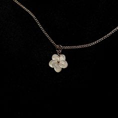 this delicate mother of pearl sampaguita pendant is handmade with care, featuring sampaguita flowers. each piece is uniquely crafted, showcasing the natural variations of mother of pearl and the artistry that makes every pendant one of a kind. paired with a matching chain, this pendant adds a touch of elegance and meaning to any outfit. your order will be packaged in a gift box, ready for gifting or safekeeping. ✨ please note: *due to the handmade nature of this piece, slight variations in desig Dainty Handmade Small Necklace, Handmade Delicate Flower Pendant Charm Necklace, Handmade White Charm Necklace For Her, Handmade White Charm Necklace As Gift For Her, Delicate Handmade White Charm Necklaces, White Jewelry With Flower Pendant Charms, Minimalist Handmade Charm Necklace With Flower Pendant, Unique White Jewelry With Flower Charm, Dainty Handmade Flower Pendant Necklace