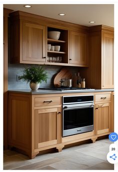 a kitchen with wooden cabinets and stainless steel appliances, including an oven in the center