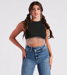 The benefits of adding this crop top to your closet are endless! Update your basics with this sleeveless top featuring a high neck, back zipper and hook-eye closure, fitted silhouette, and rhinestone fringe trim along the hem. The top is composed of stretchy rib-knit fabric. Style this top with best-selling jeans to complete the look!Fit & FeaturesSleeveless high neckBack zipper and hook-eye closureFitted silhouetteRhinestone fringe trim along the hemRib-knit fabricModerate stretchRuns true Fringe Tops For Women, Black Fringe Top, Corset Outfits, High Neck Crop Top, Rhinestone Fringe, Summer Trends Outfits, Fringe Top, Green Prom Dress, Black Fringe